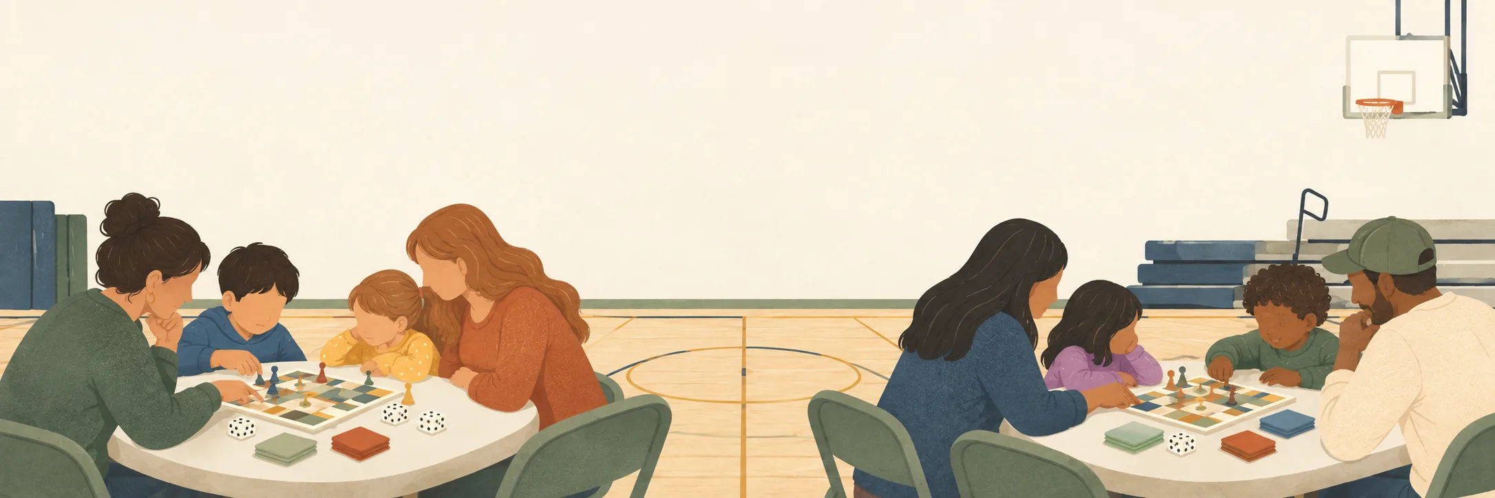 Families playing board games together in the school gym